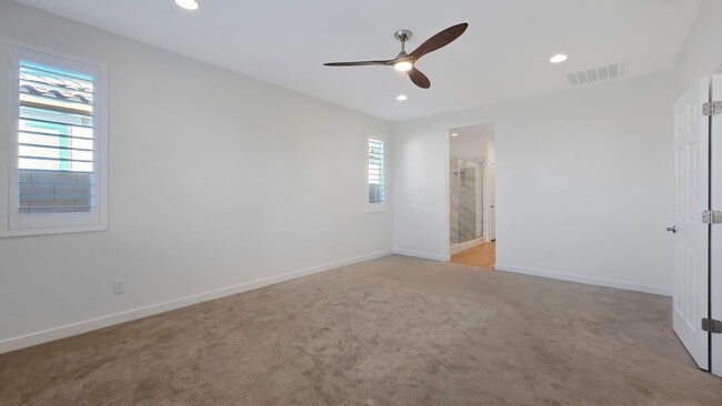 Building Photo - Pristine home in amenity rich Estrella Mountain Ranch!