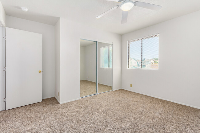 Upstairs bedroom w/lighted ceiling fan - 3748 W Carol Ann Way