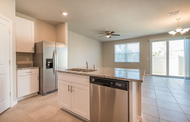 Building Photo - 3944 SE Caladium Ct
