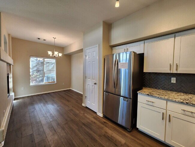Building Photo - Spacious Two-Suite Townhome With Garage, Fireplace And Community Pool