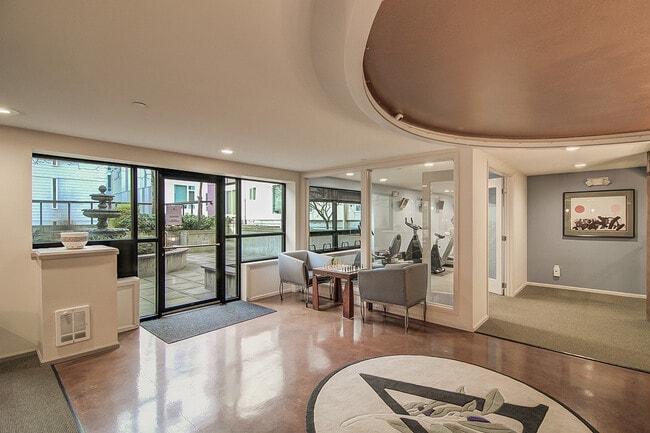 Building Photo - Top floor corner one-bedroom in the heart of it all, don't miss out, tour today!