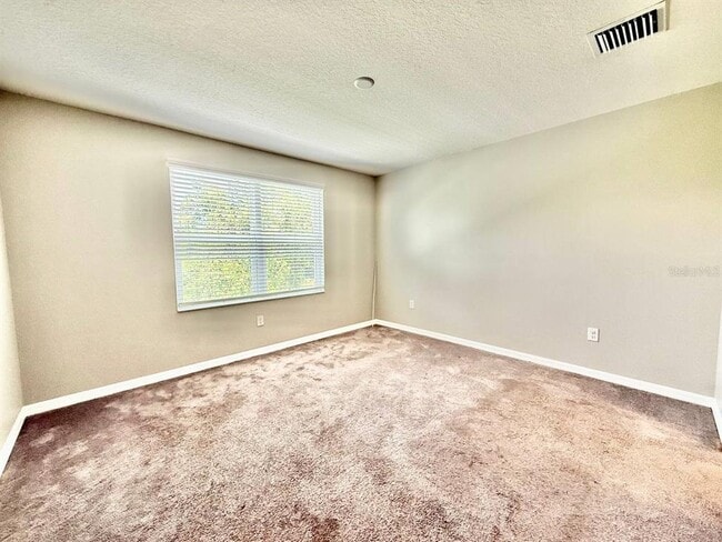 Building Photo - 7123 Summer Holly Pl