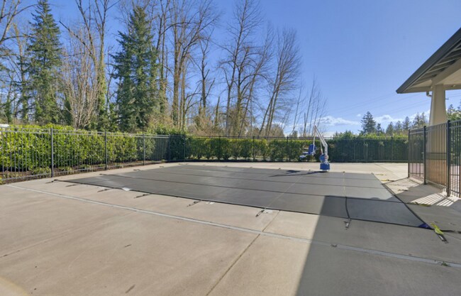 Building Photo - Modern Ground-Level Condo in River Terrace...