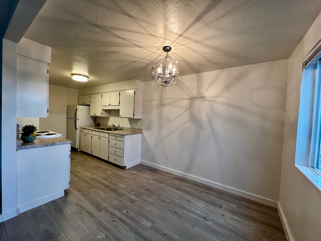 Dining area into kitchen - 523 white cloud dr