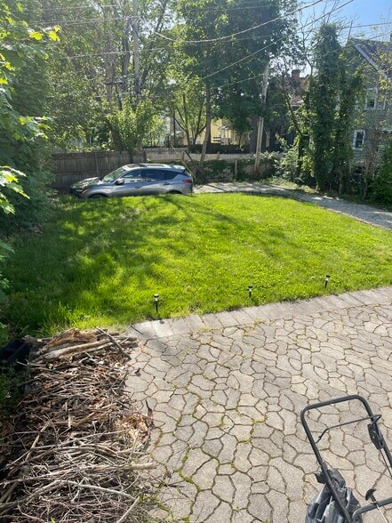 Backyard with 2 parking spots - 2441 Medary Ave