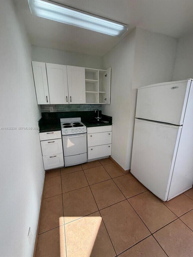 Building Photo - 3650 SW 92nd Ave