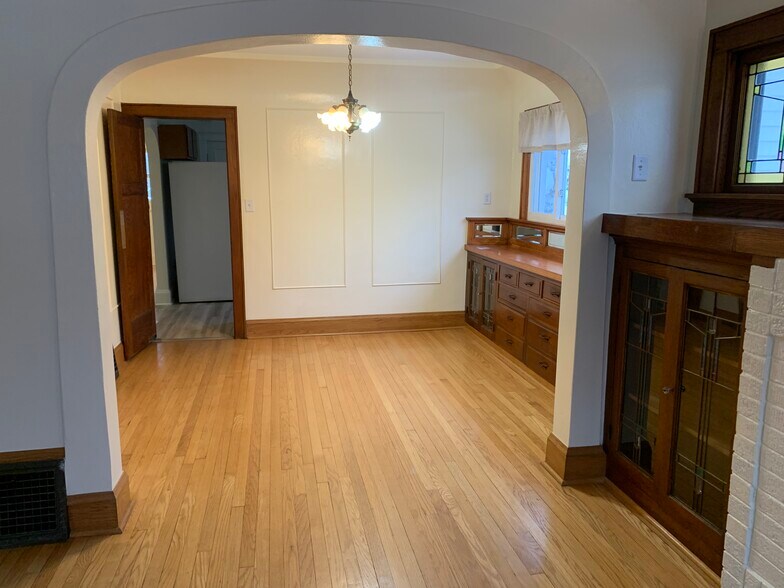 Living room to dining room. - 6830 Kinsman St