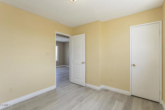 Building Photo - 3831 E Ave T 8