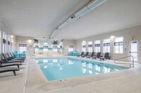 You can take a dip in our sparkling indoor pool year-round! - Pinebrook Apartments