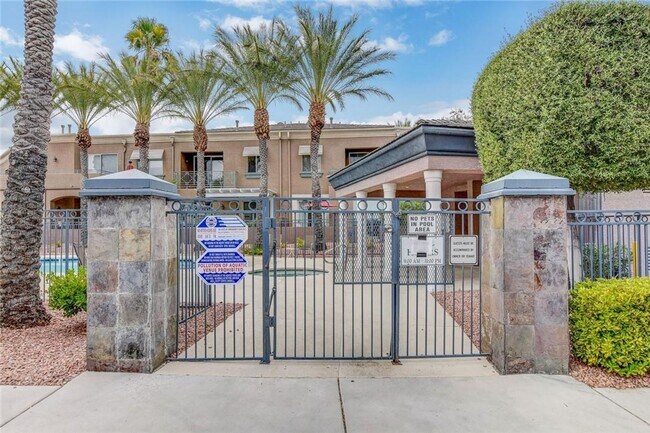 Building Photo - Amazing condominium in gated upscale neigh...