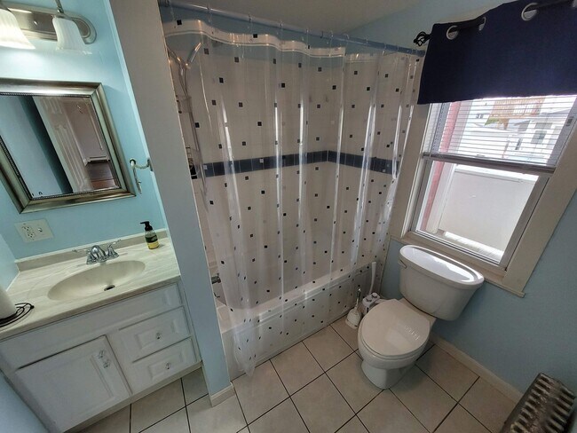 Building Photo - $2350 - 3 Bed / 1 Bath Condominium in Manchester's Somerville Neighborhood with 2 Car Off-Street ...