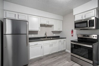 Building Photo - $1049 Renovated 2 bedroom 1 bathroom apartment with wooded views and patio