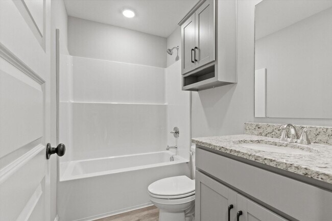 Building Photo - "Brand-New Townhome Awaits!"