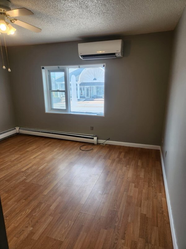 Living room with heat pump - 251 Main St