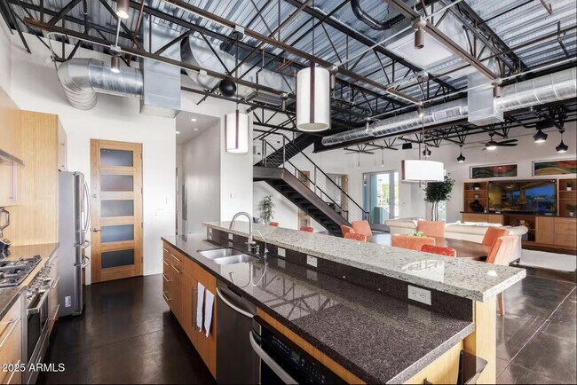 Building Photo - 7020 E 1st Ave