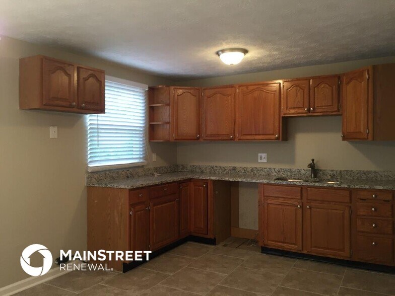 Building Photo - 1419 Mutz Dr