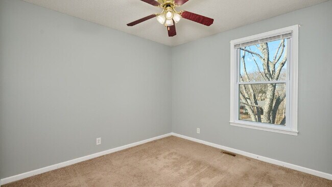 Building Photo - Now Ready : 4BR, 1 1/2BA home with fenced in back yard and storage building.