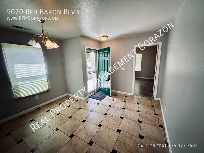 Building Photo - 9070 Red Baron Blvd