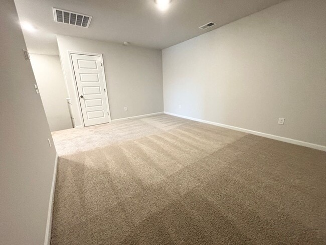 Building Photo - ABSOLUTELY BEAUTIFUL BRAND-NEW BUILD TOWNHOME