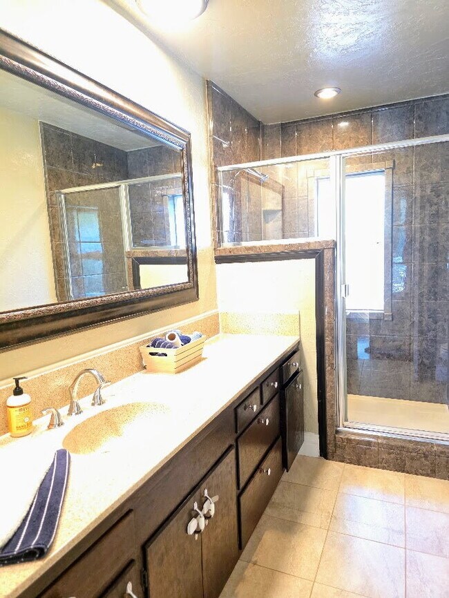 Building Photo - Breathtaking Home offers flexible living with bonus rooms ideal for an office, art studio, gym, o...