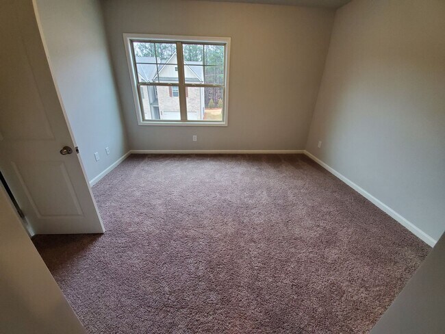 Building Photo - Charming 3-Bedroom Townhome with Stylish F...