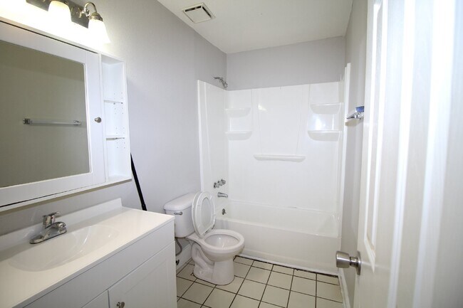 Building Photo - Brick Duplex Near NAS Pensacola & Corry Station with Tile Flooring Throughout and Fully Fenced Ba...