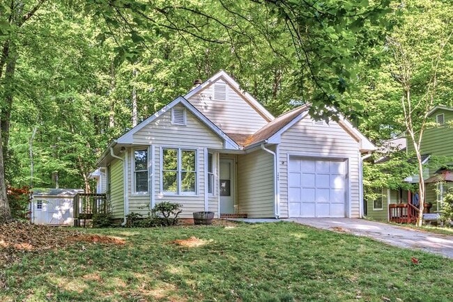 Building Photo - NW - Updated Home with Granite Counter-tops, Fire Place, Deck, Storage Building, Garage!