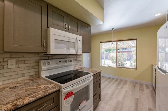 Building Photo - Modern Updated Home in Gated Community of ...