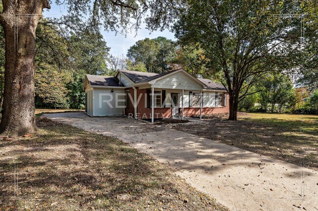 Building Photo - HALF-DEPOSIT SPECIAL!! Updated Brick 3 Bed 1 Bath Home with Huge Yard on Quiet Street!