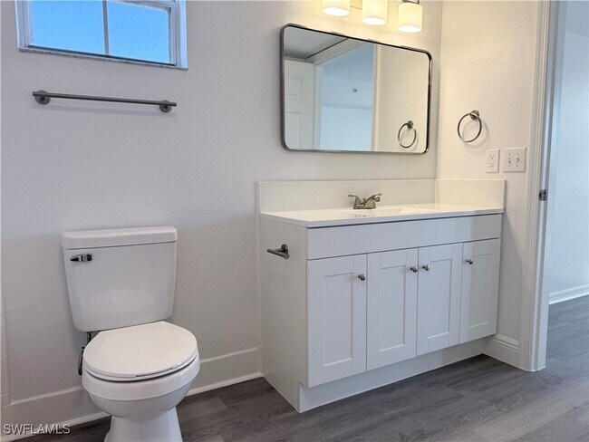 Building Photo - 8687 River Homes Lane