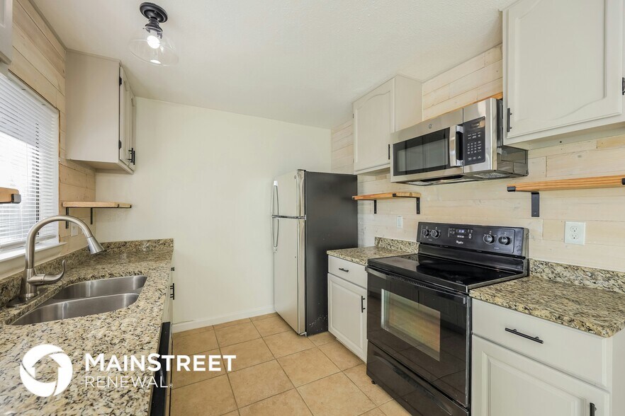 Building Photo - 5050 Gordon Cooper Dr