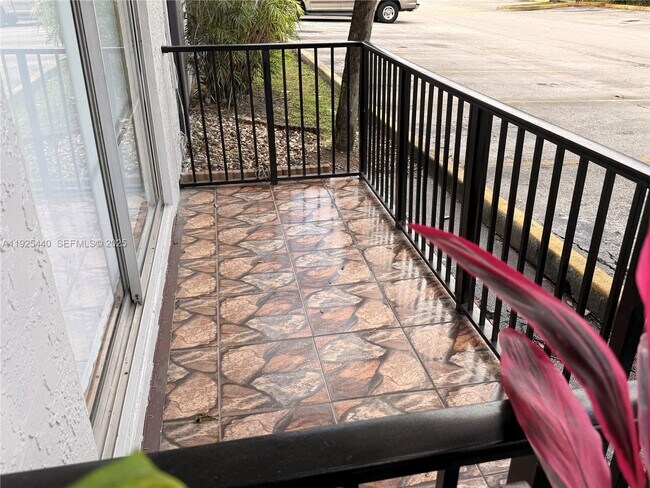 Building Photo - 8011 W 6th Ave