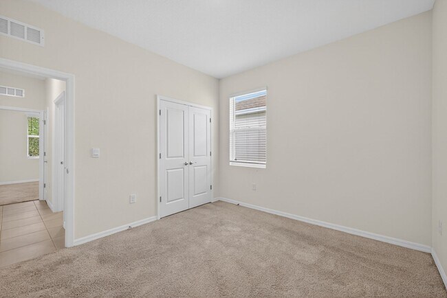 Building Photo - 4 Bedroom in Gated Community!