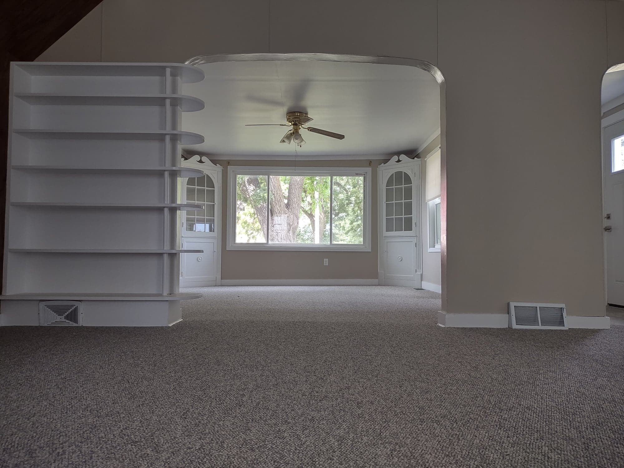 living room looking into dining room - 8563 Crane Creek Rd