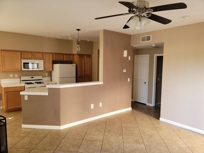 Building Photo - 2 story condo with 1 bedroom loft, 2 bathrooms and a 1 car attached garage.