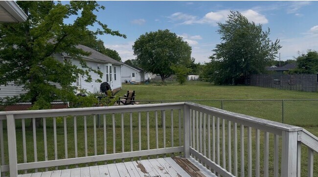 Building Photo - Fenced in backyard!