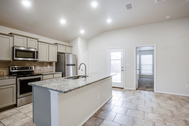 Building Photo - Granite Glam & Backyard Fun: Welcome to Yo...