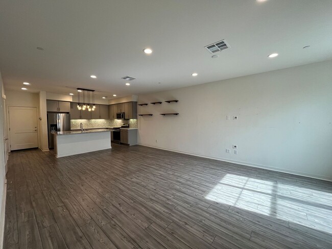Building Photo - Gated 3+2.5 w/loft, walk-in pantry + dual ...