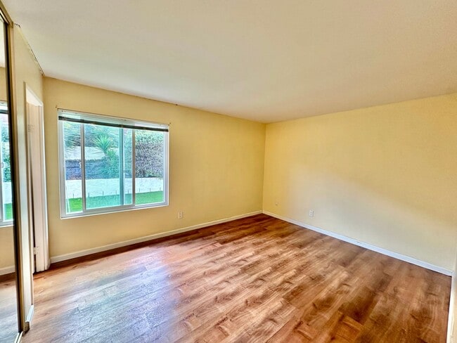 Building Photo - Remodeled 4 bedroom with central A/C and 2 car garage!