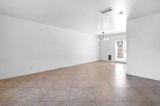 Building Photo - Spacious 3-Bed, 1.5-Bath Townhome with Oversized Private Patio in Central 89103 — Bright Bedrooms...