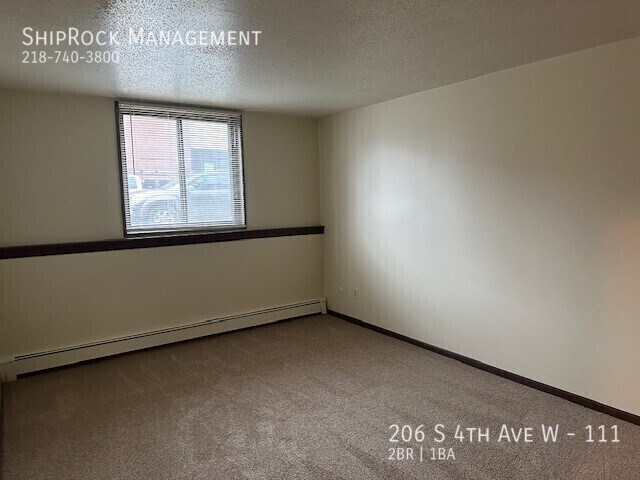 Building Photo - 206 S 4th Ave W