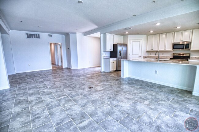 Building Photo - Annual Unfurnished Rental – New Construction Coach Home 3 Bedrooms, 2 Baths, 2 Car Garage, with R...