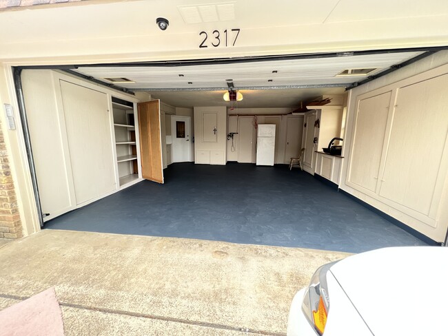 storage space in garage - 2317 Ridgewood Dr