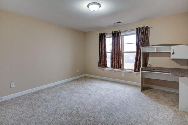 Building Photo - Welcome to your dream home in the gated La...