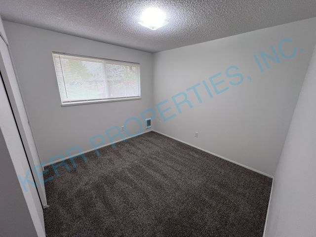 Building Photo - Cozy 2-Bedroom Duplex with Fireplace Charm...