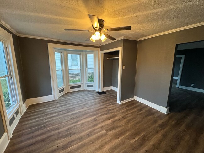 Building Photo - Spacious 4-Bedroom Home with Porch, Deck and Fenced Yard!