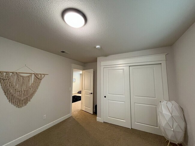 Building Photo - Spacious Corner-Lot Home with Three Levels...