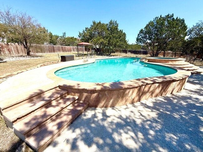 Building Photo - *COMING SOON* Luxurious 2-Story Home in Gated Stone Oak Community – Pool & Lawn Care Included