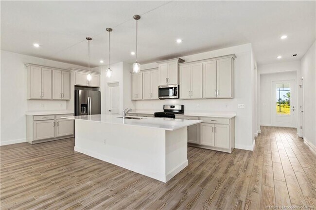 Building Photo - 14143 SW Safi Ter