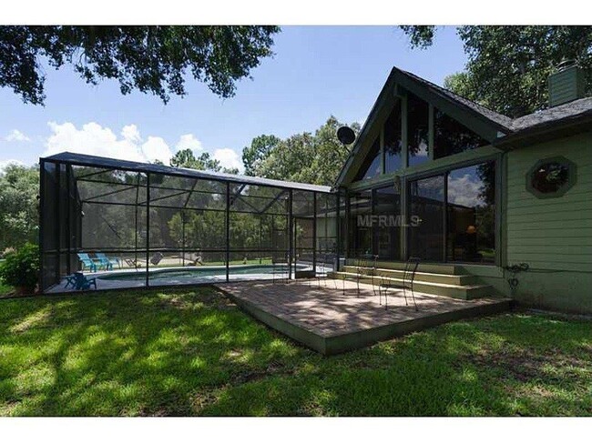 Building Photo - BEAUTIFUL 4/2 POOL HOME ON LAKE IN APOPKA ...